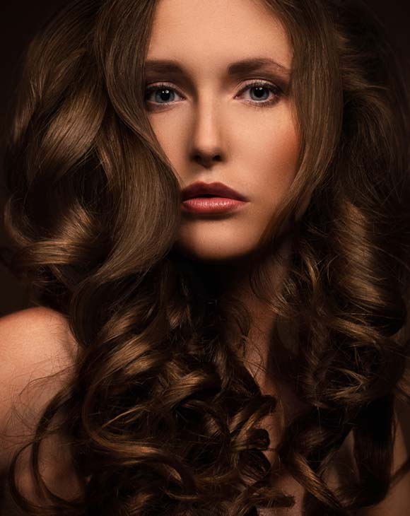 Beautiful woman with long curly hair